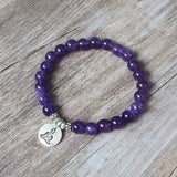 Bratara zen cu cristale semipretioase din ametist 8 mm si pandantiv argintiu gravat cu Buddha Feng shui pentru meditatie, liniste, echilibru