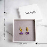 Talisman al Claritatii – Cercei cu Ametist si Nod Elegant